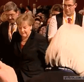 Bundeskanzler Angela Merkel witzig mit Bier